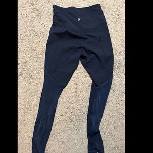 Black Lululemon leggings with mesh back! 7/8
